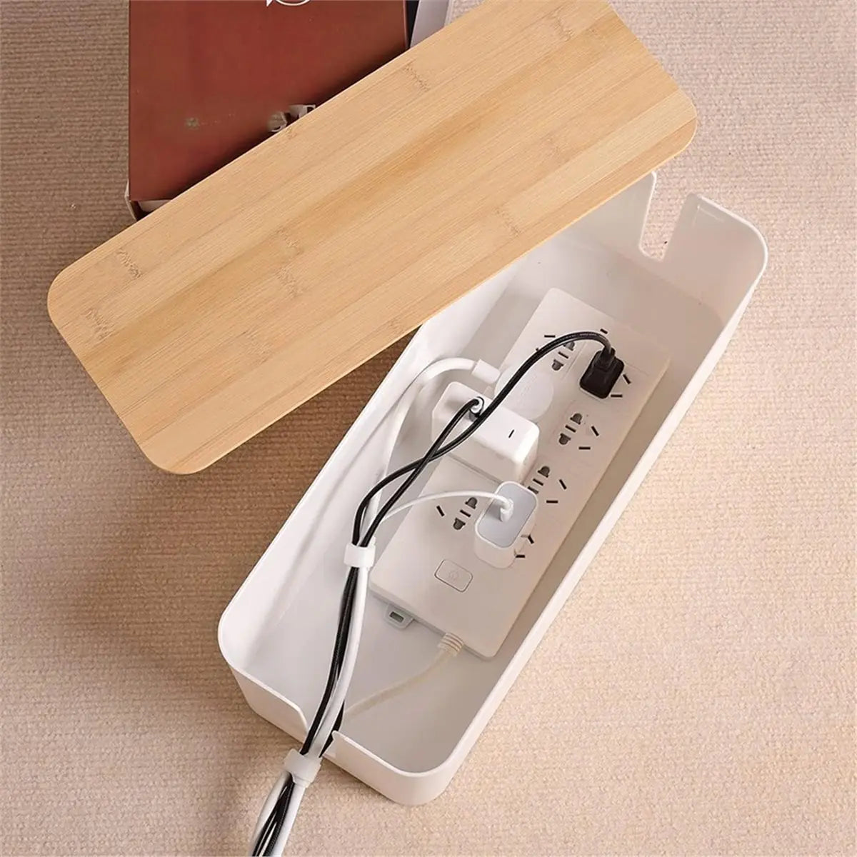 Cable box open, power strip inside